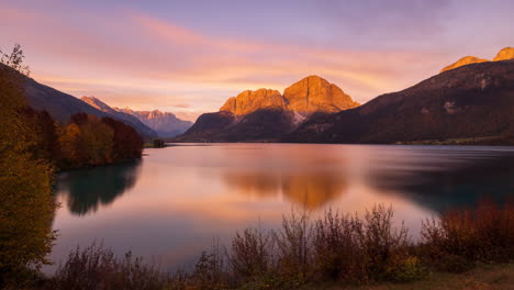 scenic lake at sunset with mountains