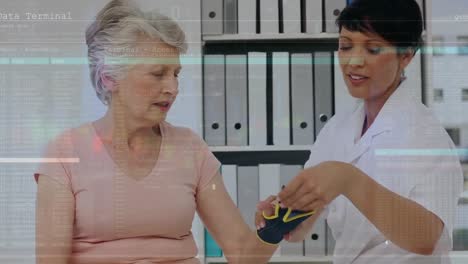 Animation-of-data-processing-over-diverse-female-doctor-examining-hand-of-female-senior-patient