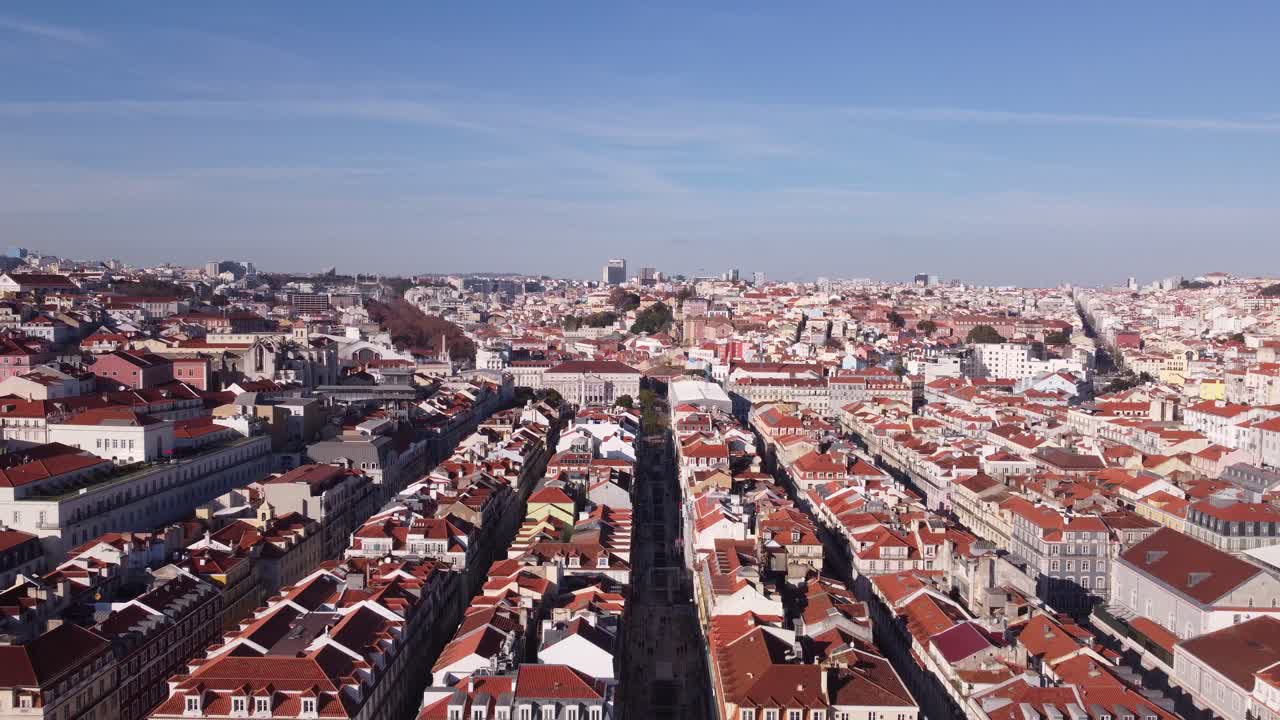 Once in a lifetime backwards drone flight over the Rua da Prata over the Arco da Rua Augusta and Praça do Comércio out to the open ocean in Lisbon Portugal Europe