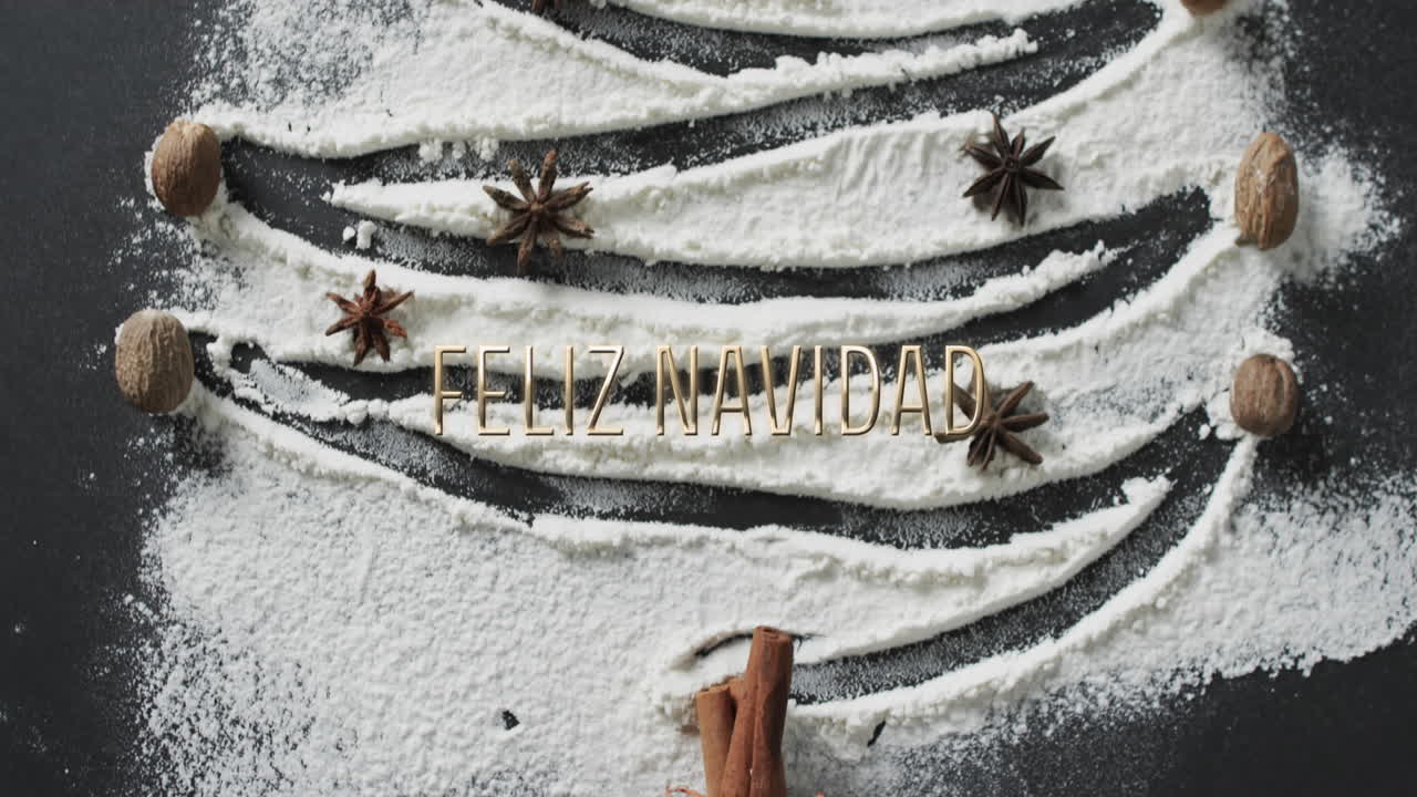 texto de feliz navidad sobre el árbol de navidad dibujado en harina sobre fondo negro
