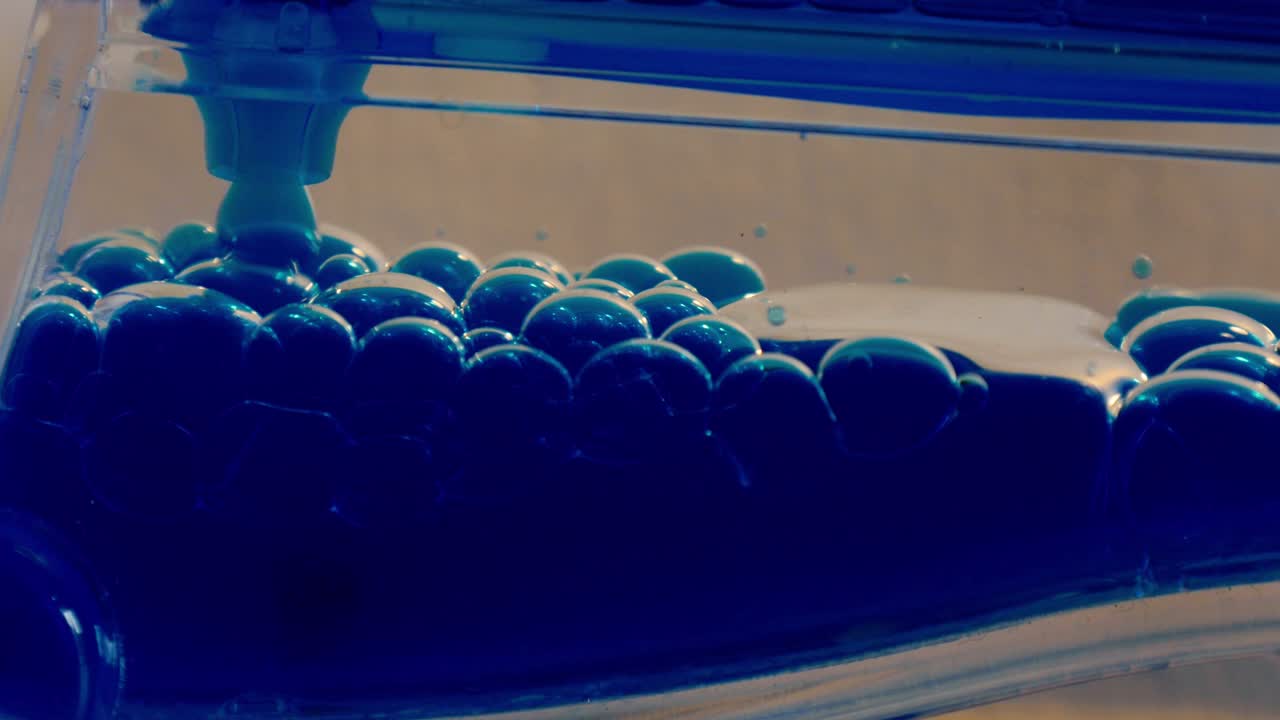 Ink Substance Dripping Into Container