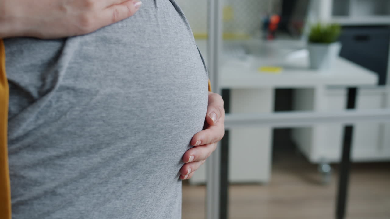 Pregnant Woman in Office