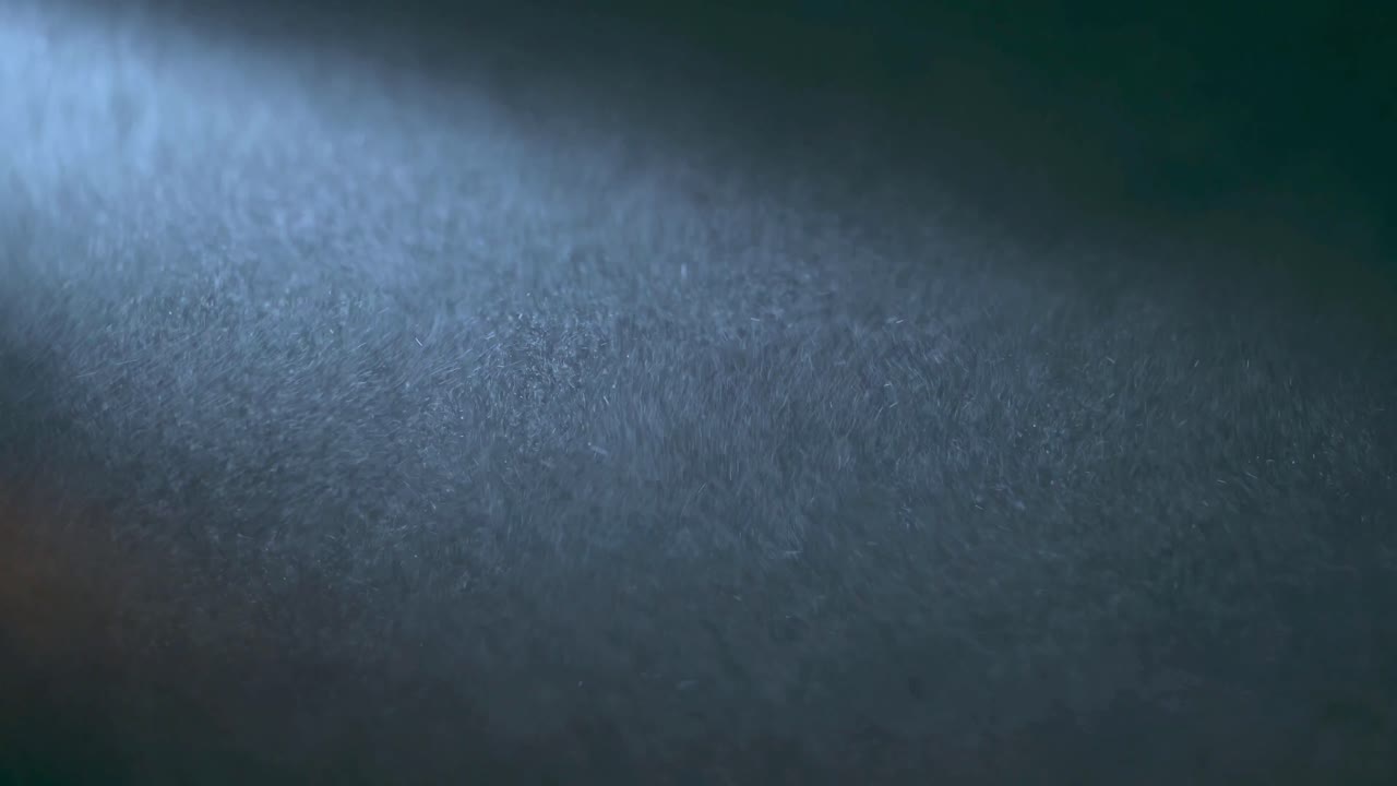 Floating Dust Particles in a Beam of Light