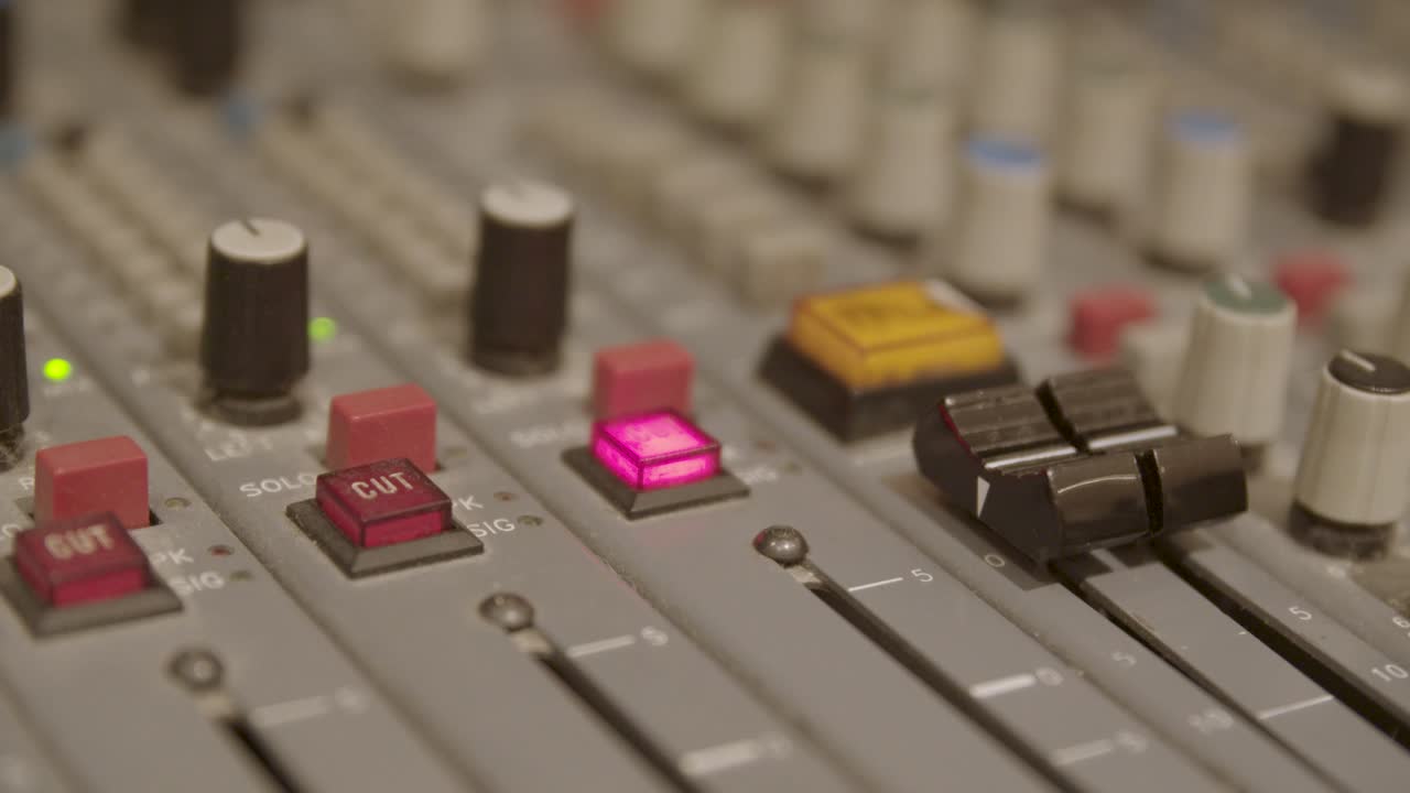 Recording studio - Close up of vintage mixing desk faders