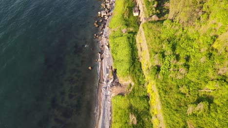 drone-shoot-of-Black-sea-Batumi-coast-beautiful-nature-railway-mountains-nature-side-of-Batumi-beach-sunset