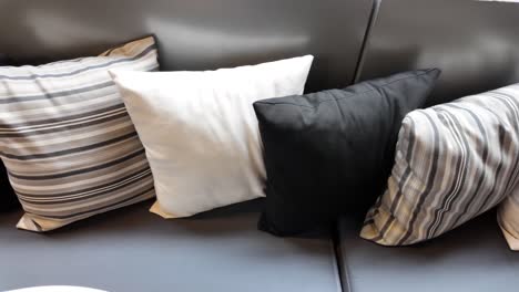 stylish pillows on a grey sofa