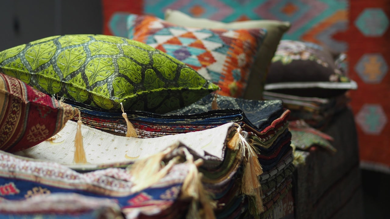 Vibrant Ethnic Pillows and Textiles on Display in a Shop