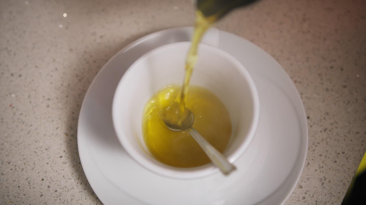 Relaxing Herbal Tea Poured Into A Cup In The Afternoon At Home