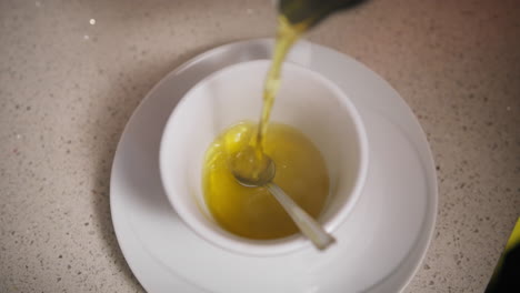 relaxing herbal tea poured into a cup in the afternoon at home