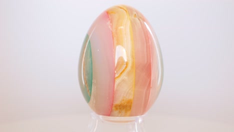 layered mineral egg, likely made from agate or quarts