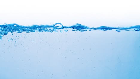 Many-bubbles-in-water-close-up,-abstract-water-wave-with-bubbles-in-slow-motion