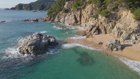 mediterranean beach paradisiaca turquoise blue waters no people aerial view drone spain catalunya costa brava blanes lloret de mar mallorca balearic islands