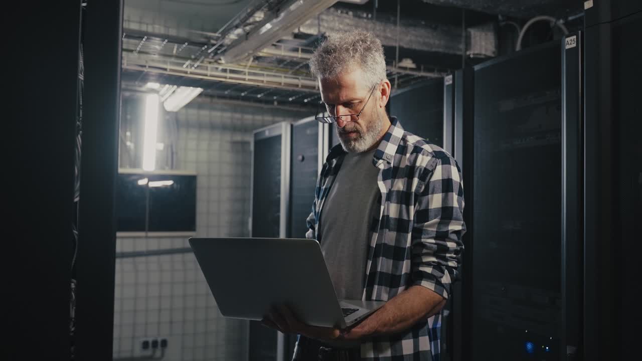 Technician working in a server room
