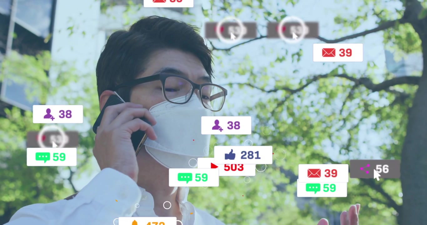 スマートフォンで電話に応答するマーケターの周りに、成長を追跡する通知アイコンが浮かび上がる。