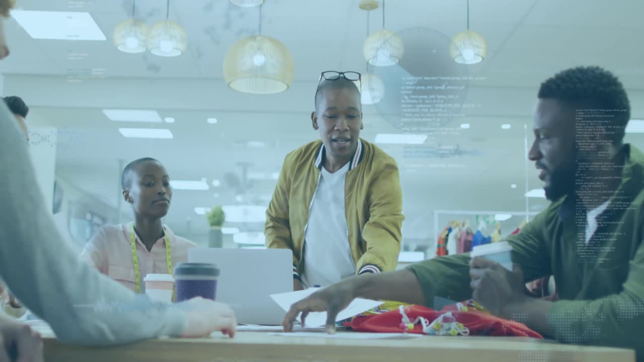 Animation of data processing over african american man talking to his colleagues at office