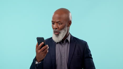 Black-man-in-studio-with-phone