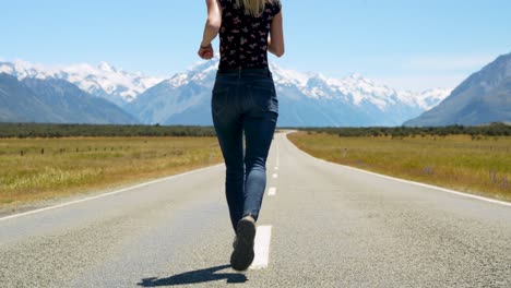 Woman-celebrating-on-State-Highway-80-with-Mt