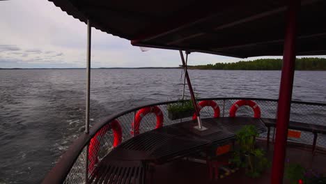 bench on the back of a steamboat