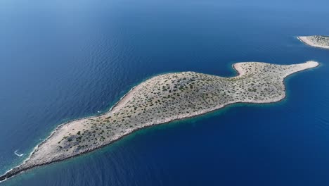 aerial panoramic orbit kornati national park, revealing rugged terrain and isolated islands with sparse vegetation in deep blue sparkling water, establishing, croatia