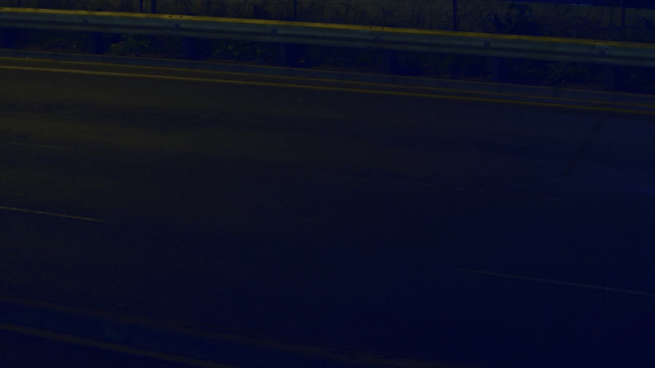 Red light streak passing spurring hologram charts rising over road, bars, pies showing traffic flow