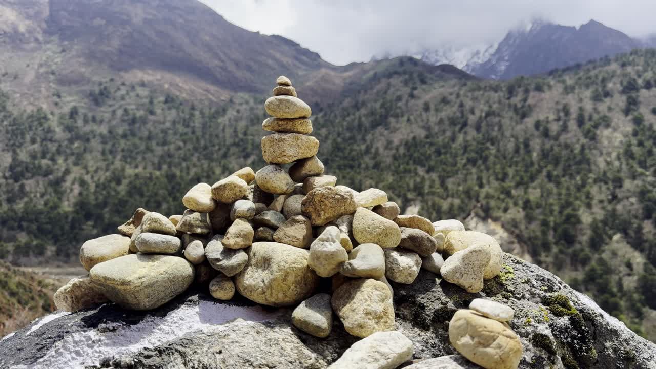 A sacred Buddhist prayer stone stands along the Everest Base Camp trail, reflecting local culture and Himalayan spirituality.