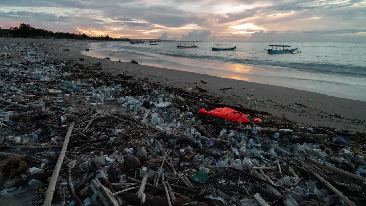 Plastic Pollution on a Beach at Sunset