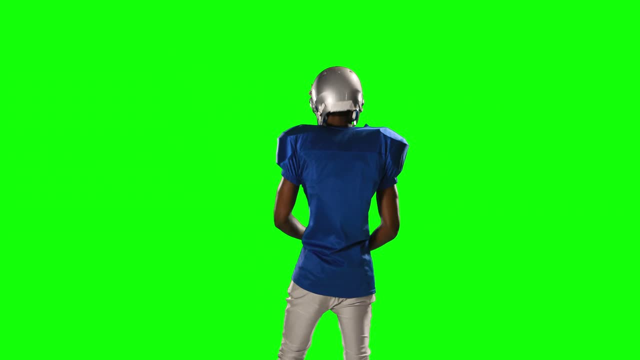 Giocatore di football americano su green screen