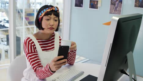 young woman working in a creative office