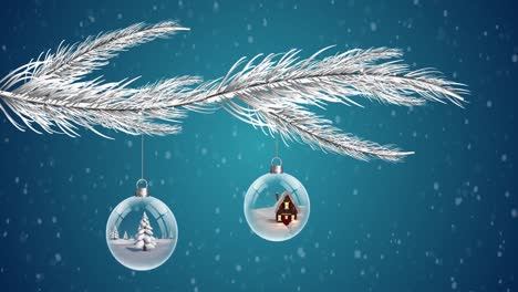 Two-clear-Christmas-baubles-dangling-from-Christmas-tree-against-snowflakes-falling-on-blue-backgrou