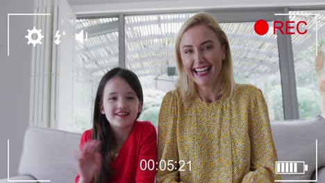 animation of recording frame over happy caucasian woman and her daughter making video call