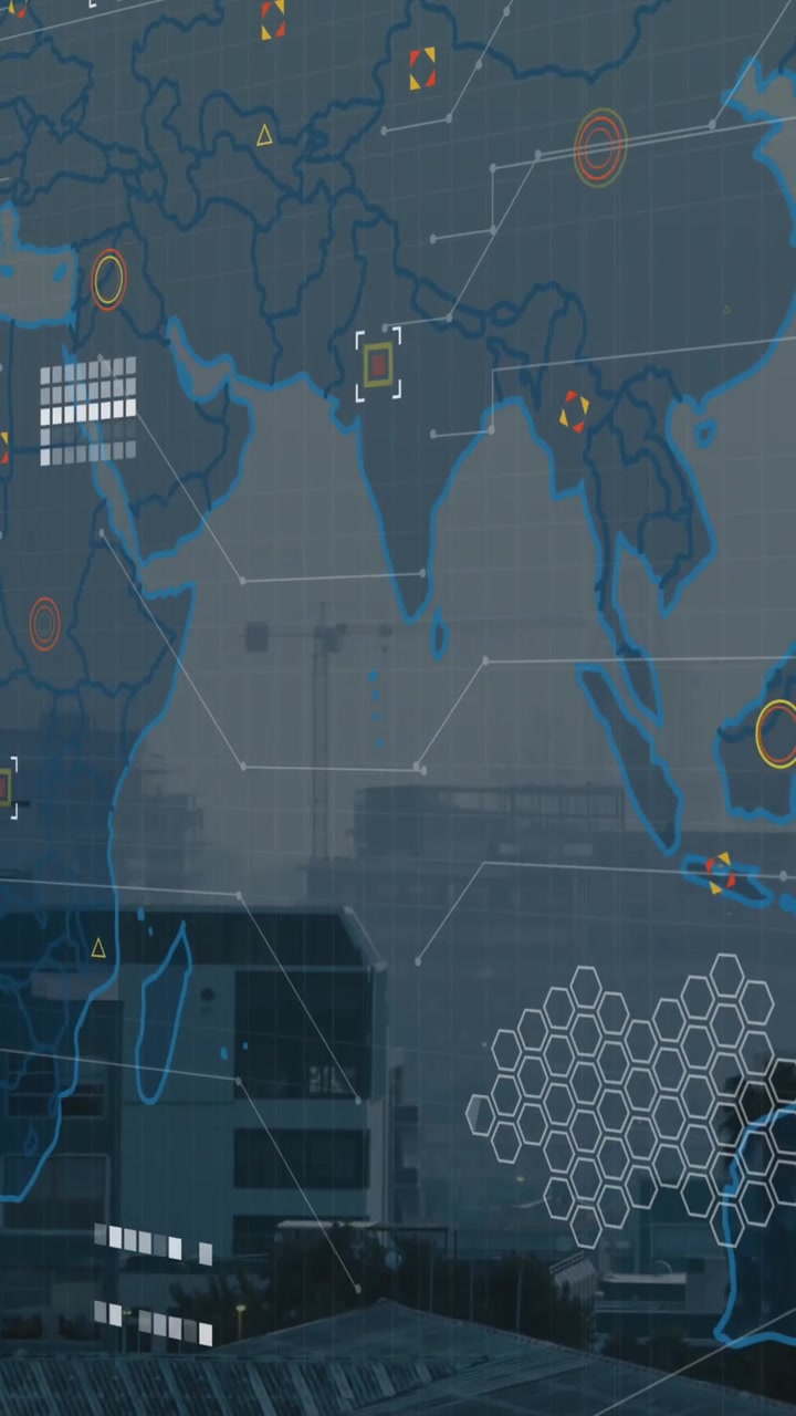 Animation of world map and data processing against aerial view of cityscape