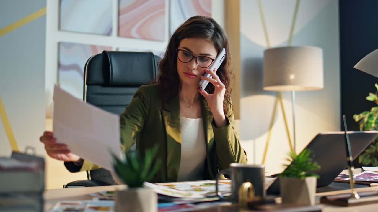 Professional worker talking phone at workplace close up. Office manager calling