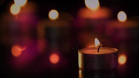 animation of tea light candles with flickering spots of light
