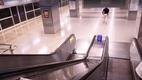 a person walks through a subway station