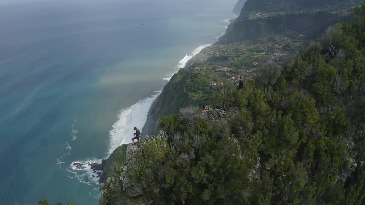 Dramatic revealing drone shot of the coastline of Madeira