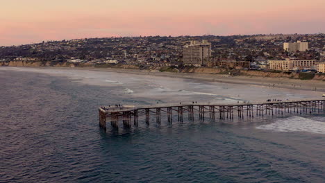 Beautiful-4k-aerial-flight-over-Crystal-Pier-extending-over-the-ocean