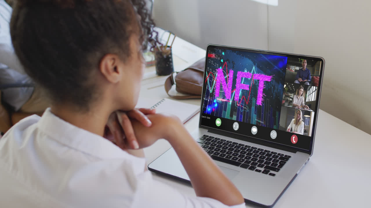 Video of biracial woman having nft video call with coworkers