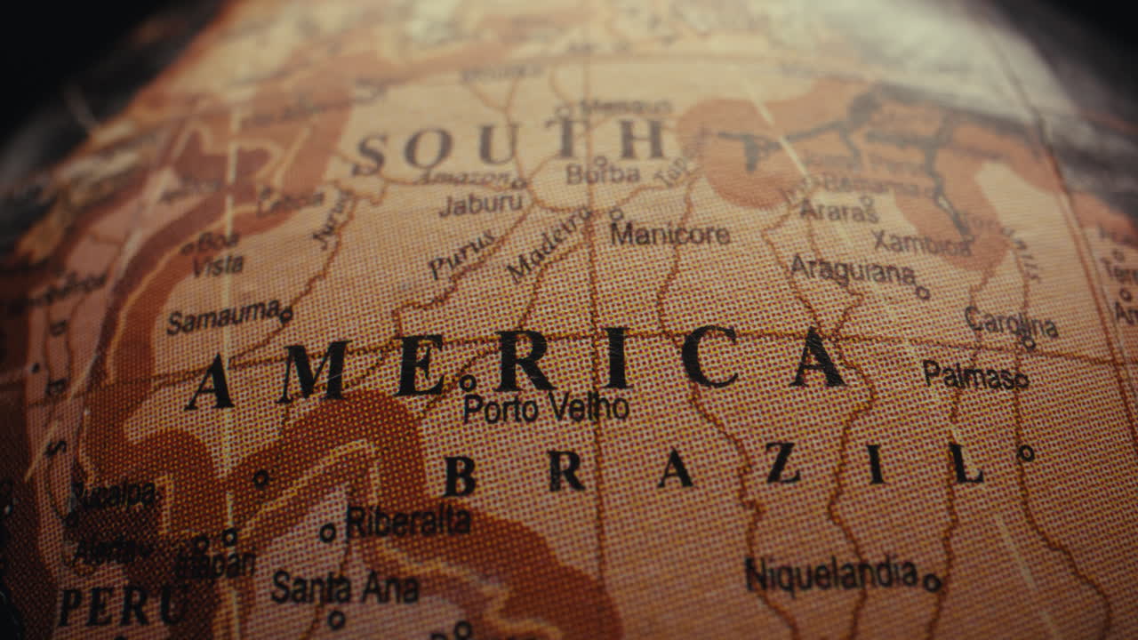 Close-up of a vintage world globe focusing on South America and Brazil