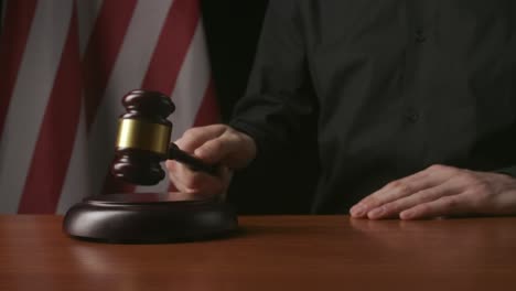 judge with gavel and american flag