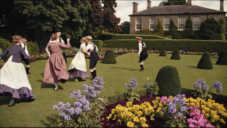 children's dance in a formal garden