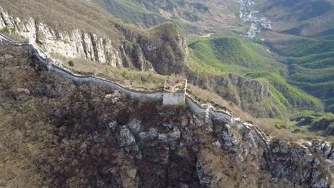 monochrome autumn aerial of broken section of great wall of china