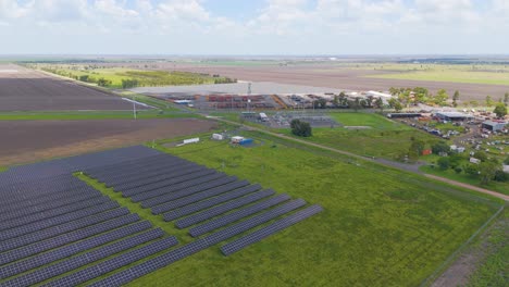 aerial view of solar panels and junkyard