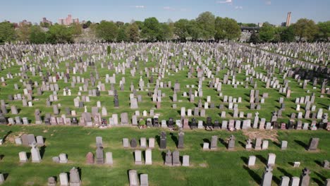 low aerial over crosses and tombstones in a graveyard