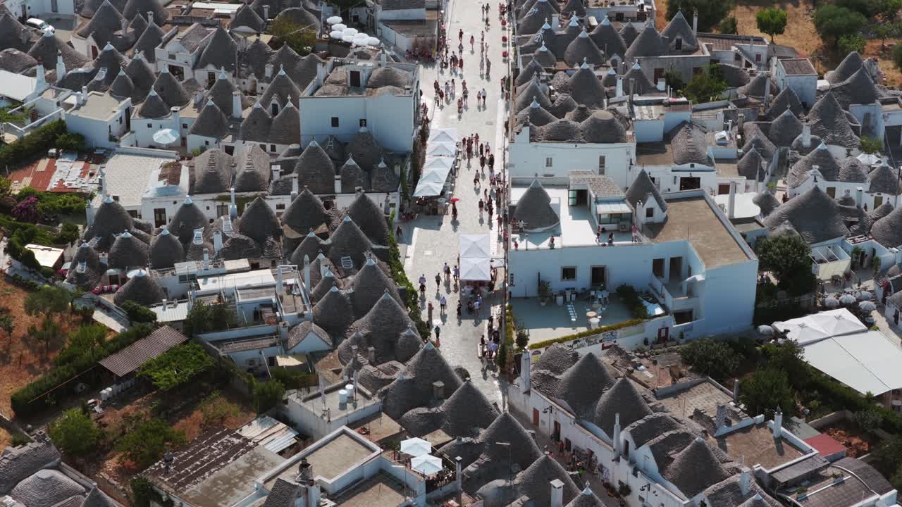 Unique conical roofs of trulli houses, aerial view of Alberobello, Puglia, Italy