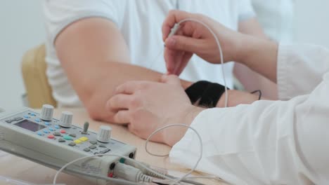 patient nerves testing using electromyography at medical center