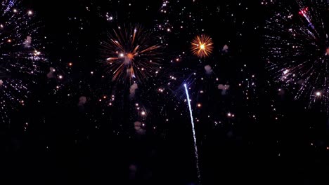 Colorful-fireworks-exploding-in-the-night-sky.-Celebrations-and-events-in-bright-colors.