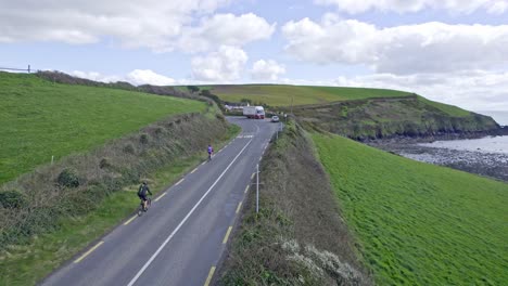 cyclists climbing on the copper coast drive waterford