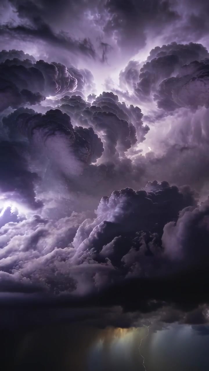 Vertical video: Showing cumulonimbus core flashing, charges forming, bolts striking toward horizon
