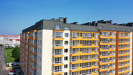street of modern residential district. exterior of new high-rise multi story apartment building