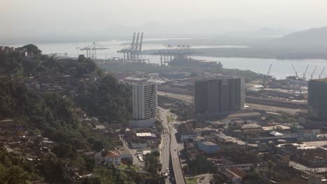 Aerial-wide-view-of-Port-of-Santos-harbor-and-cityscape,-Sao-Paulo-coast,-Brazil